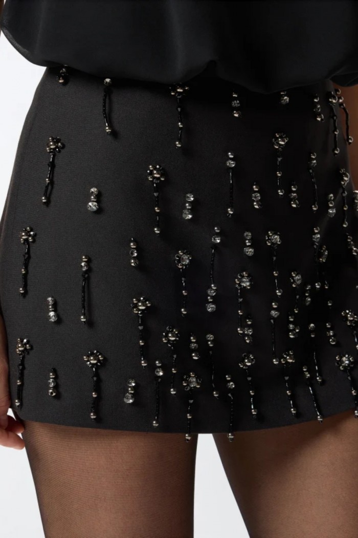 MINIGONNA CON CRISTALLI E PERLE PINKO